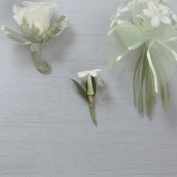 Stephanotis Boutonniere from Roses and More Florist in Dallas, TX