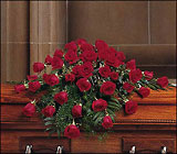 Blooming Red Roses Casket Spray from Roses and More Florist in Dallas, TX